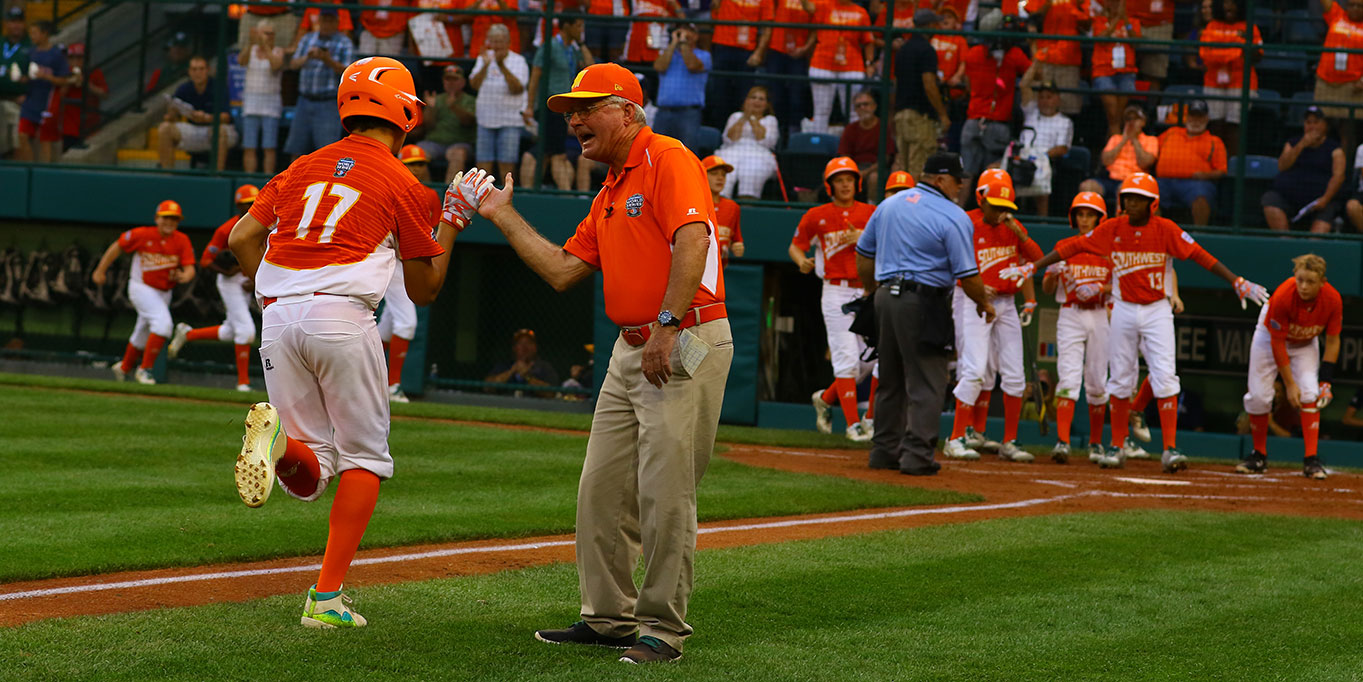 Bud Maddux Congratulating Player