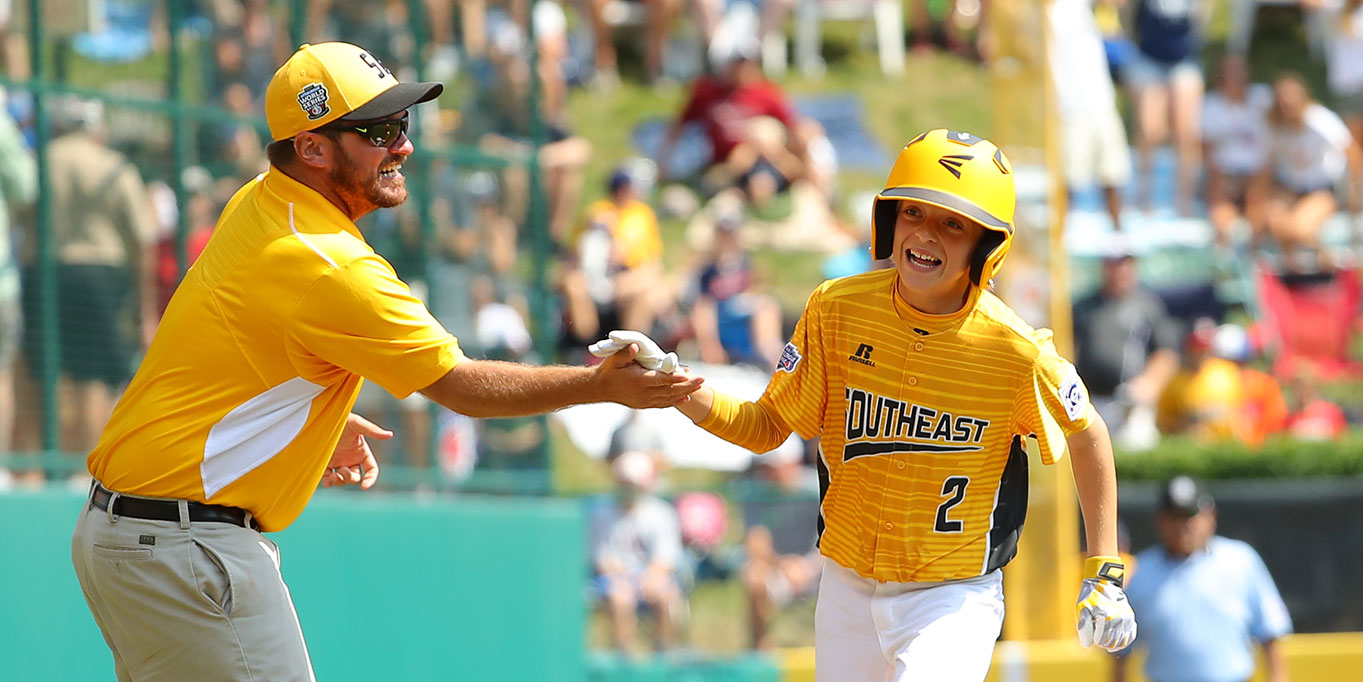 Player and Coach High-fiving